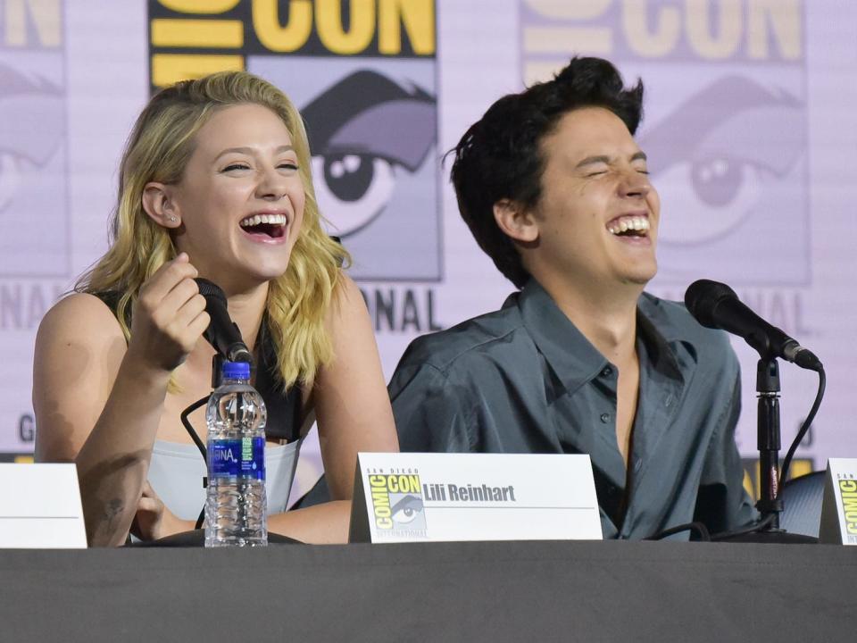 Lili Reinhart, left, and Cole Sprouse participate in the "Riverdalel" panel on day four of Comic-Con International on Sunday, July 21, 2019, in San Diego.