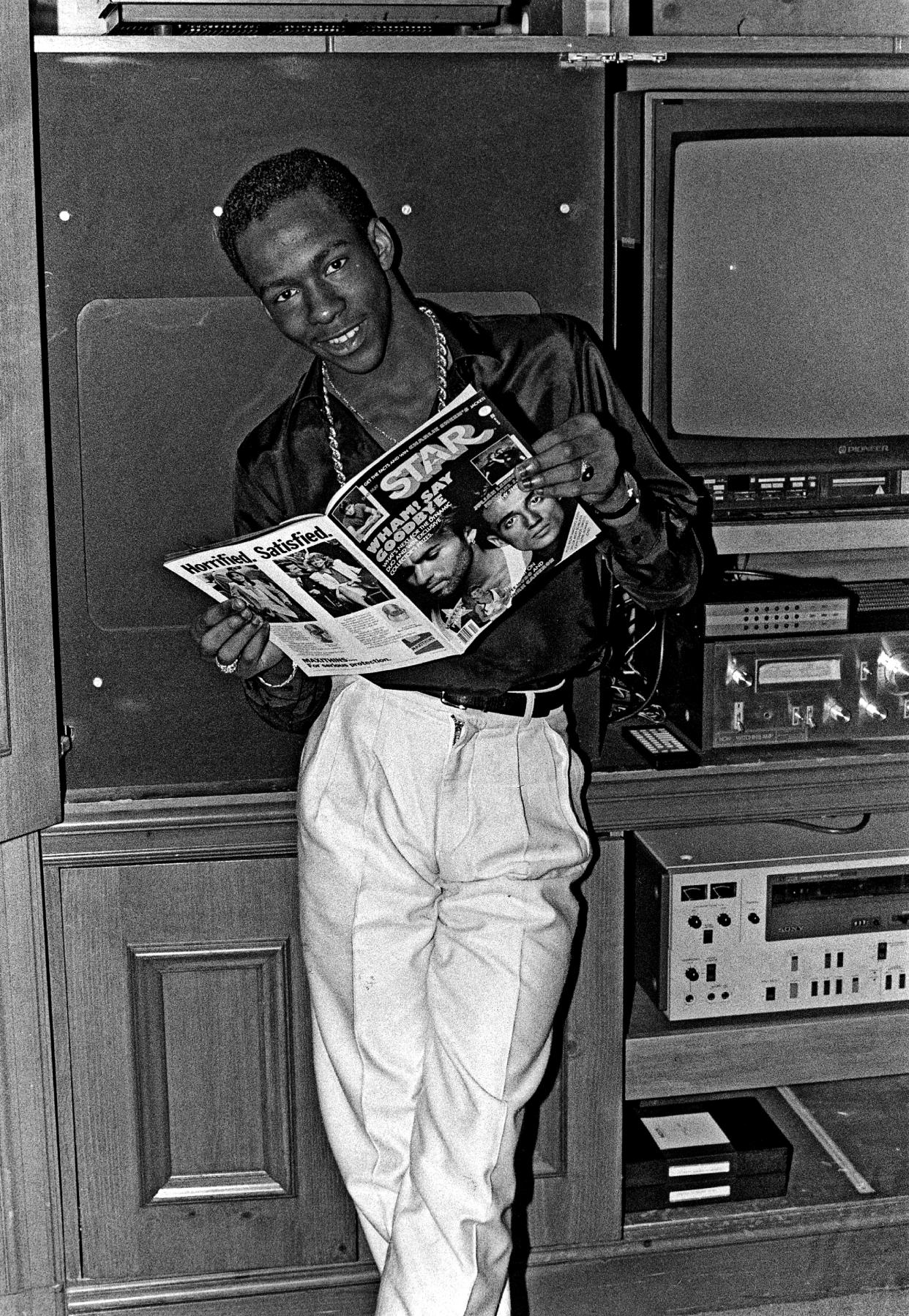 R&B singer Bobby Brown poses for a portrait session holding an October 1986 issue of Right On Magazine in Los Angeles, California. (Photo by Michael Ochs Archives/Getty Images)