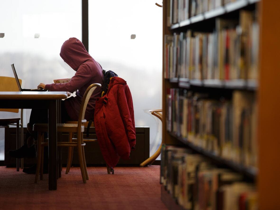 The Toronto Public Library says it has been told by the city to find a way to keep its budget at the same level for 2023. (Katherine Holland/CBC - image credit)