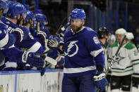 Tampa Bay Lightning defenseman Erik Cernak (81) celebrates his goal against the Dallas Stars with the bench during the third period of an NHL hockey game Wednesday, May 5, 2021, in Tampa, Fla. (AP Photo/Chris O'Meara)