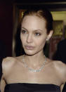 <p>Angelina shows off her killer cheek bones and signature pout back in 2000. [Photo: Getty] </p>