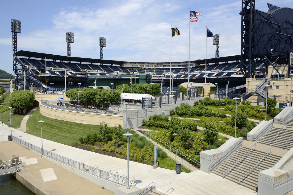 Green lawn area along the Allegheny River at PNC Park, Pittsburgh, home of the Pittsburgh Pirates with field and seating in view