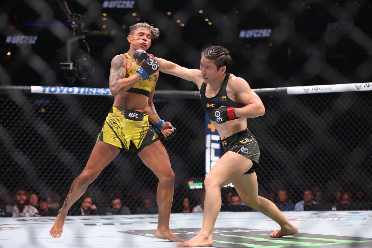 Zhang Weili, right, dominated Amanda Lemos to retain the strawweight title (Getty Images)