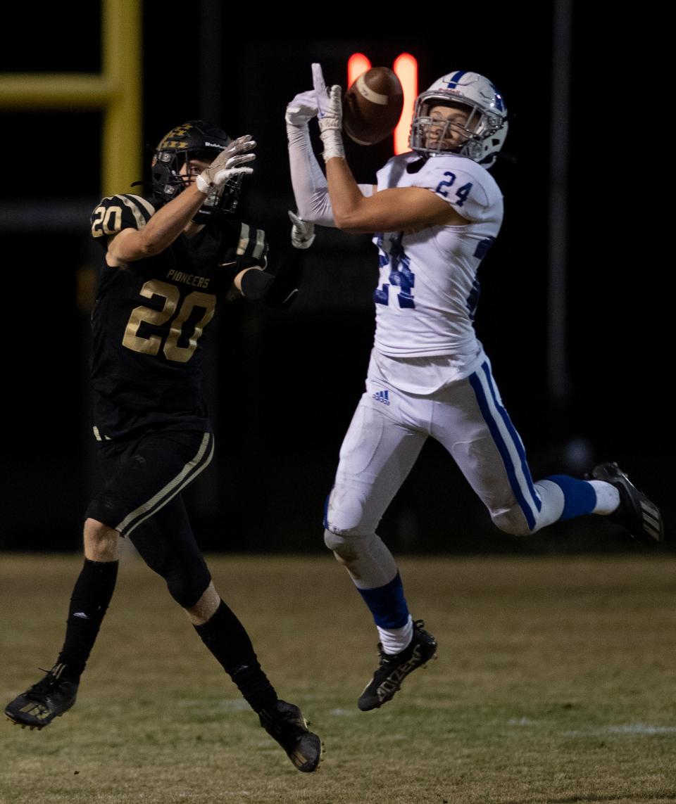 Memorial’s Jackson Draper (24) nearly intercepts a pass intended for Boonville’s Cooper Aigner (20) during their IHSAA 4A Sectional Championship game at Bennett Stadium in Boonville, Ind., Friday night, Nov. 4, 2022. Memorial beat Boonville 33-14.