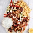 <p>Chicken souvlaki is a classic <a href="https://www.delish.com/uk/food-news/a30624859/greek-food/" rel="nofollow noopener" target="_blank" data-ylk="slk:Greek;elm:context_link;itc:0;sec:content-canvas" class="link ">Greek</a> fast food dish that will make you feel like you’re on holiday in no time. Consisting of grilled skewered pieces of meat, you eat it hot straight off the skewer and can serve it with a variety of sides - we've gone for flatbreads and chips, with <a href="https://www.delish.com/uk/cooking/recipes/a28839760/best-greek-salad-recipe/" rel="nofollow noopener" target="_blank" data-ylk="slk:Greek salad;elm:context_link;itc:0;sec:content-canvas" class="link ">Greek salad</a> and a good dollop of <a href="https://www.delish.com/uk/cooking/recipes/a30960236/authentic-tzatziki-recipe/" rel="nofollow noopener" target="_blank" data-ylk="slk:tzatziki;elm:context_link;itc:0;sec:content-canvas" class="link ">tzatziki</a>. </p><p>Get the <a href="https://www.delish.com/uk/cooking/recipes/a35901474/chicken-souvlaki/" rel="nofollow noopener" target="_blank" data-ylk="slk:Chicken Souvlaki;elm:context_link;itc:0;sec:content-canvas" class="link ">Chicken Souvlaki</a> recipe.</p>