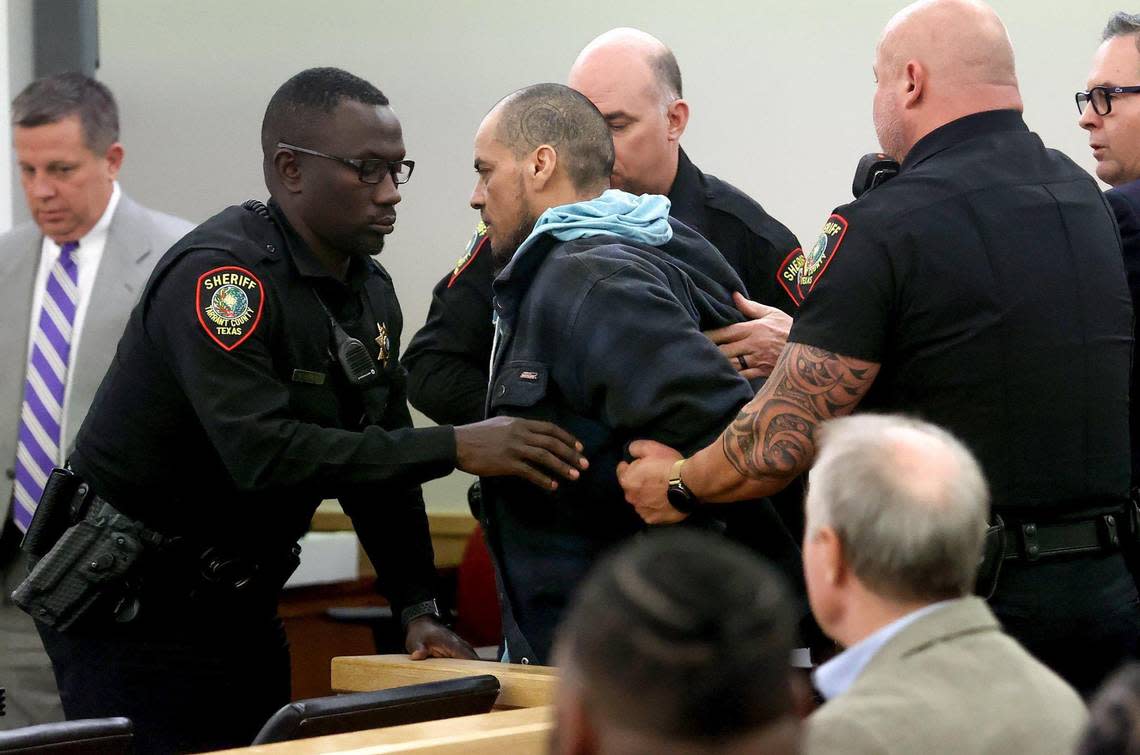 Tarrant County sheriff’s deputies take Manuel Mata into custody after he refused to be sworn in as a witness by Judge George Gallagher on Friday, December 16, 2022, in Tarrant County’s 396th District Court in Fort Worth. Gallagher revoked Mata’s bond on a prior arrest and ordered him into custody.