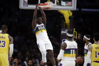 New Orleans Pelicans' Zion Williamson (1) dunks against the Los Angeles Lakers during the first half of an NBA basketball game Tuesday, Feb. 25, 2020, in Los Angeles. (AP Photo/Marcio Jose Sanchez)