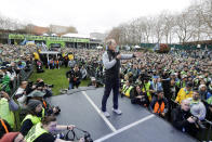 FILE - In this Nov. 12, 2019, file photo, Seattle Sounders head coach Brian Schmetzer talks to supporters during a rally in Seattle to celebrate the Sounders defeat of Toronto FC to win the 2019 MLS Cup championship soccer match. The Sounders announced Monday, Jan. 25, 2021, that the team and Schmetzer had reached agreement on a multiyear contract extension. (AP Photo/Ted S. Warren, File)