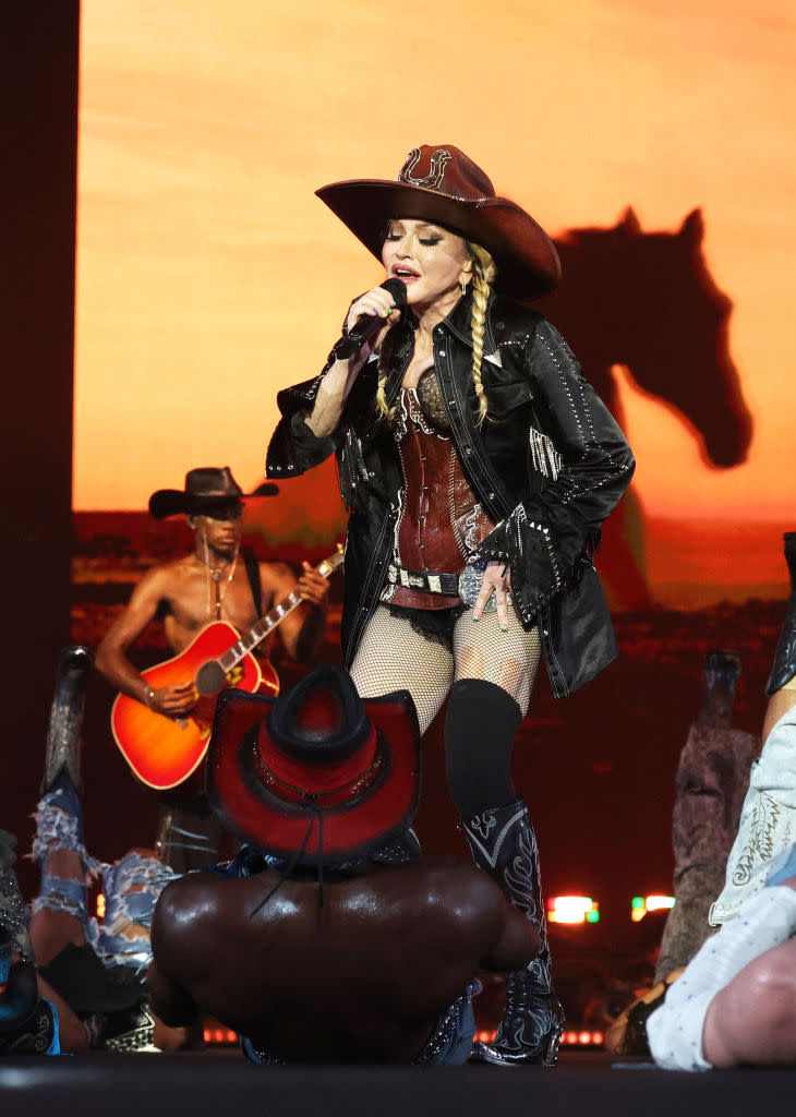 Madonna performs during "The Celebration Tour" on May 4 in Rio de Janeiro, Jean Paul Gaultier, leather corset, Miu Miu boots