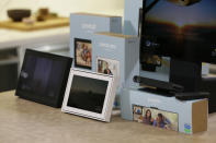 In this photo taken Tuesday, Sept. 17, 2019, new Facebook Portal products are displayed during an event in San Francisco. From left is the Portal, the Portal mini and Portal TV. Facebook is slashing the price and the size of the Portal, its screen and camera-equipped gadget for making video calls with friends and family as it attempts to get the device into more homes. (AP Photo/Eric Risberg)