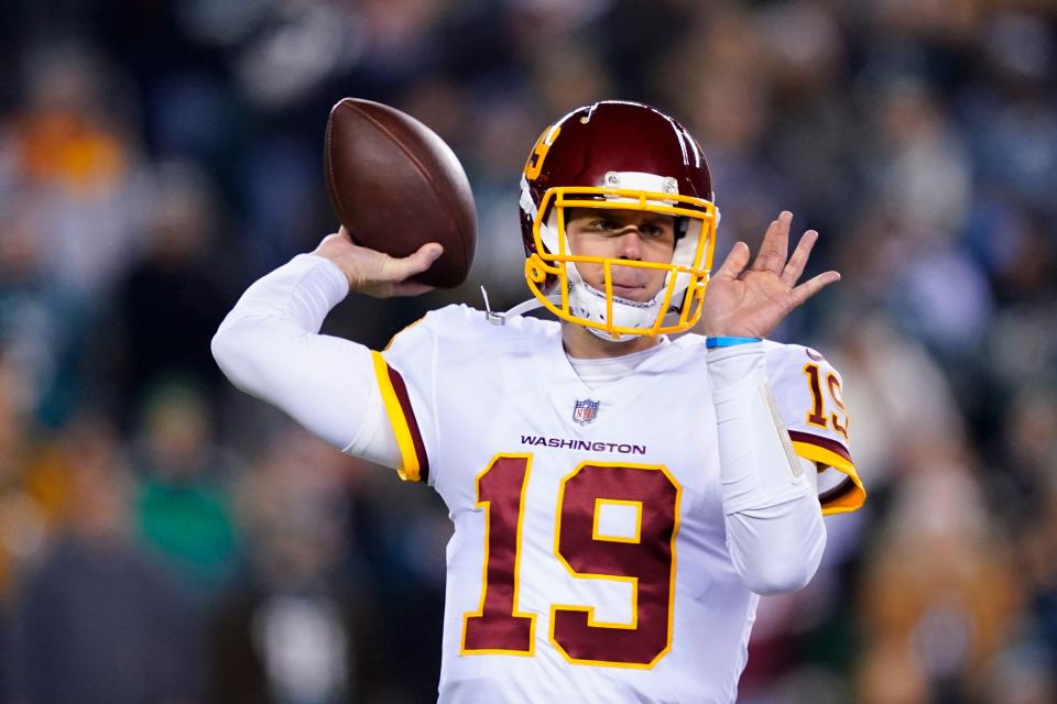 Washington Football Team quarterback Garrett Gilbert looks to pass during the first half of an NFL football game against the Philadelphia Eagles, Tuesday, Dec. 21, 2021, in Philadelphia. (AP Photo/Matt Slocum)