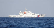 A China Coast Guard vessel patrols at the disputed Scarborough Shoal April 5, 2017. Picture taken April 5, 2017. REUTERS/Erik De Castro