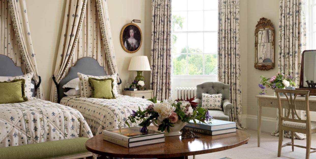 simpson uses her family’s 18th century oxfordshire country house as a lively design laboratory in this guest room and throughout, she experiments with embroidered fabrics and antique reproduction wood furnishings