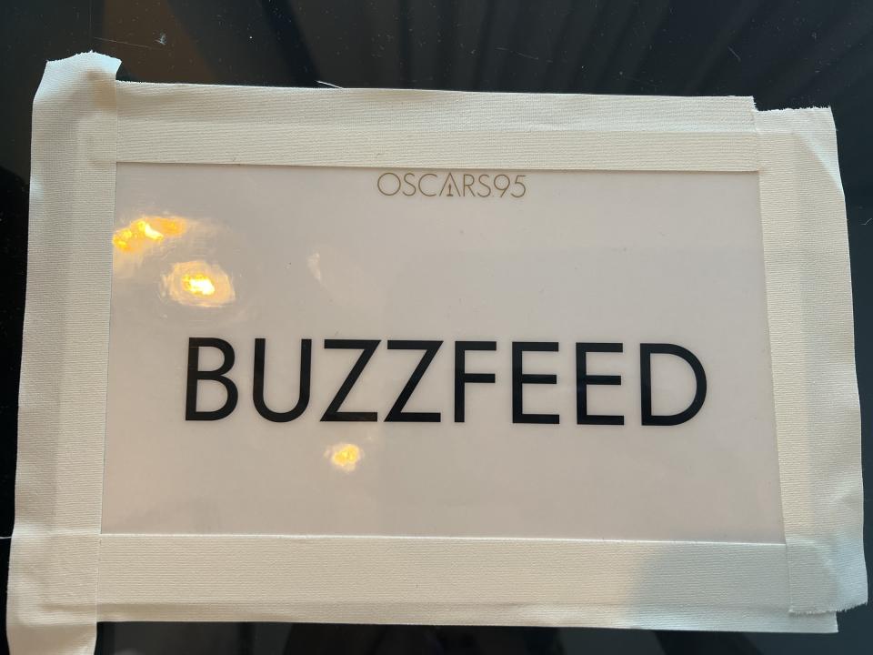 A closeup of a BuzzFeed placard