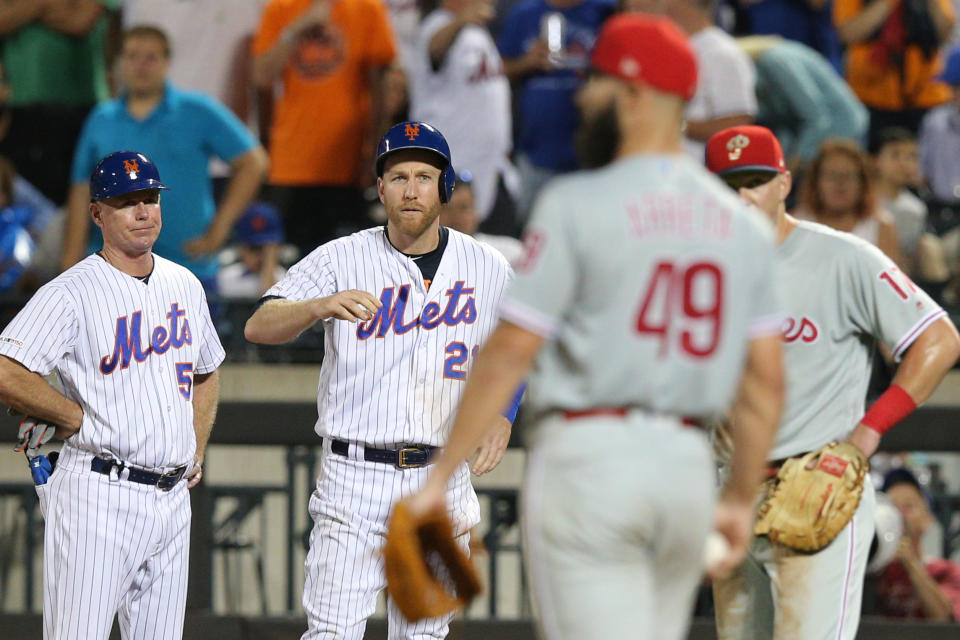 Jul 6, 2019; New York City, NY, USA; New York Mets third baseman Todd Frazier (21) reacts after being hit by a pitch by Phillies starting pitcher Jake Arrieta (49) during the fifth inning at Citi Field. Mandatory Credit: Brad Penner-USA TODAY Sports