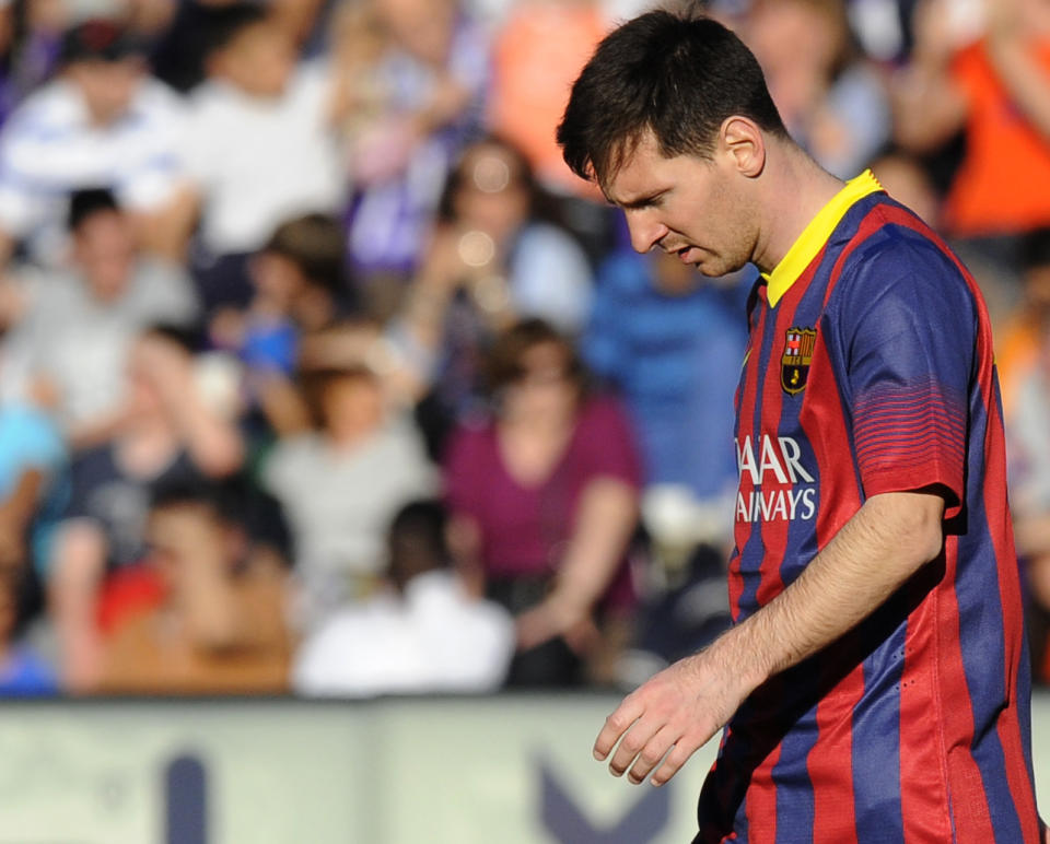 FC Barcelona's Lionel Messi from Argentina is seen during a Spanish La Liga soccer match against Real Valladolid at the Jose Zorrilla stadium in Valladolid, Spain on Saturday March 8, 2014. (AP Photo/Israel L. Murillo)