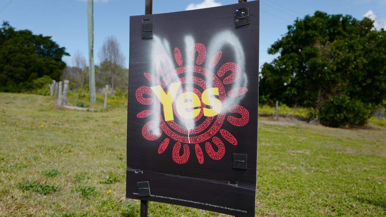  A 'Yes' campaign poster with 'No' sprayed on it. 