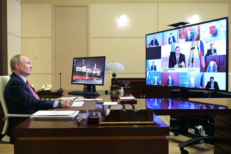 Vladimir Putin attends a virtual roundtable meeting with French business leaders and members of the Franco-Russian Chamber of Commerce via video conference, April 2021.