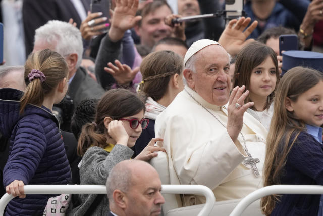 Pope Francis waves as he arrives for his weekly general audience in St. Peter's Square at The Vatican, Wednesday, May 17, 2023. (AP Photo/Andrew Medichini)