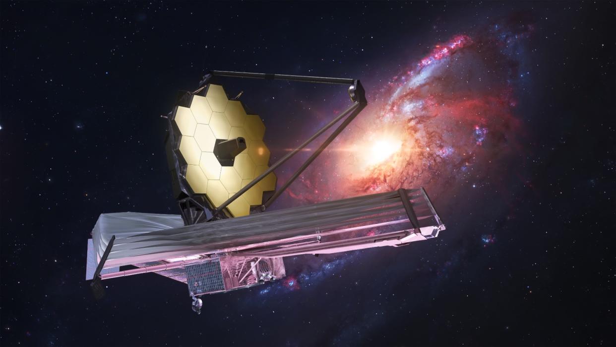  a spacecraft with a large gold hexagon on top in deep space 