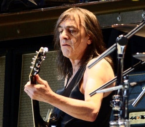 <span class="caption">Malcolm Young: the engine room of AC/DC.</span> <span class="attribution"><span class="source">Pandemonium73 via Wikimedia Commons</span>, <a class="link " href="http://creativecommons.org/licenses/by-nd/4.0/" rel="nofollow noopener" target="_blank" data-ylk="slk:CC BY-ND;elm:context_link;itc:0;sec:content-canvas">CC BY-ND</a></span>