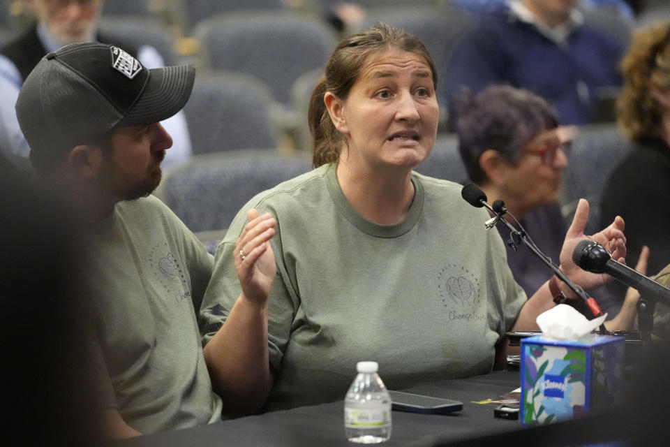 Nicole Herling, sister of shooter Robert Card, testifies Thursday, May 16, 2024, in Augusta, Maine, during a hearing of the independent commission investigating the law enforcement response to the mass shooting in Lewiston, Maine. (AP Photo/Robert F. Bukaty)