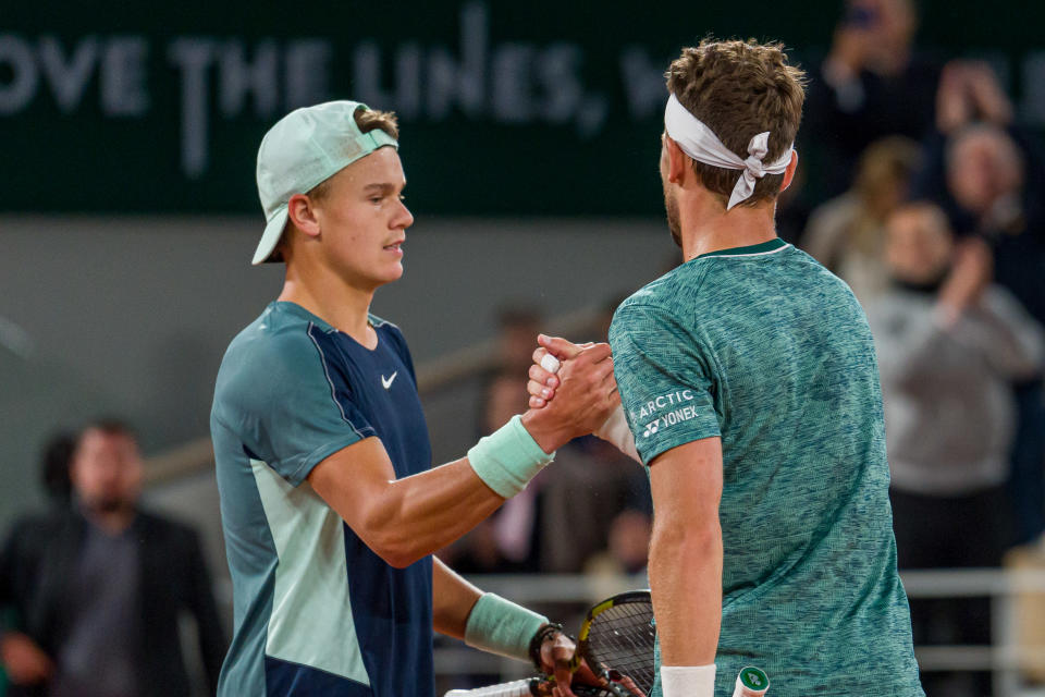 Holger Rune and Casper Ruud, pictured here shaking hands after their quarter-final clash at the French Open.