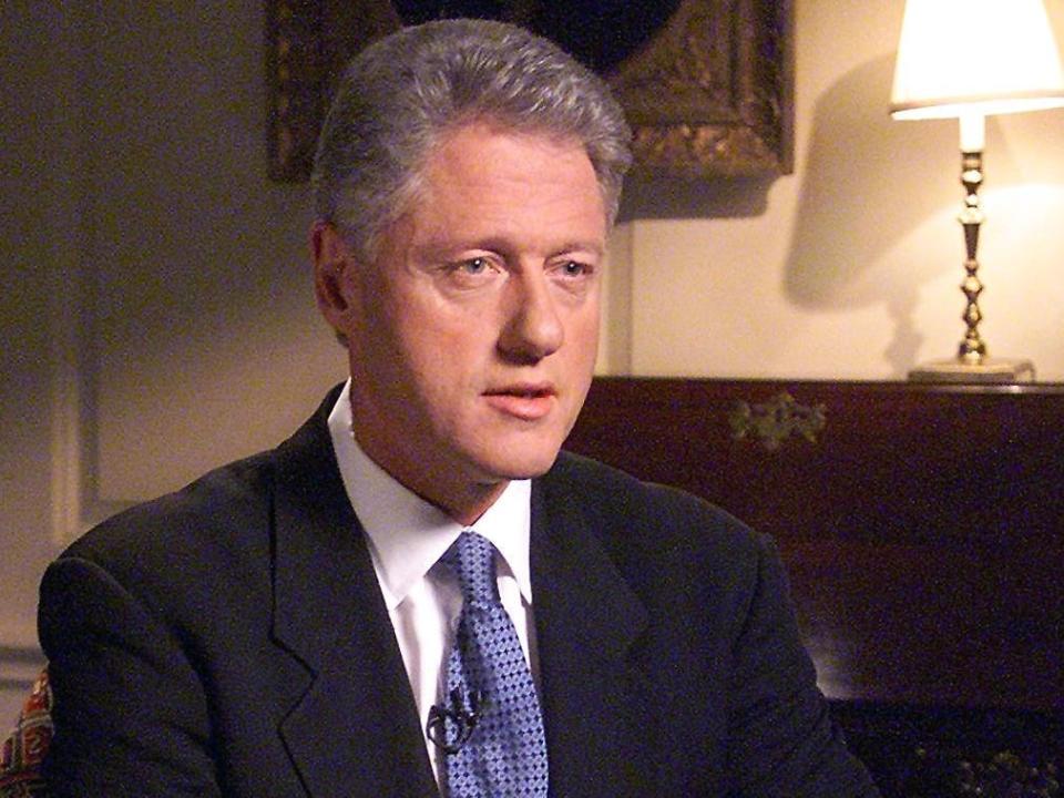 US President Bill Clinton poses for photographers 17 August in the Map Room of the White House in Washington, DC, just before delivering his televised address to the American people regarding his testimony earlier 17 August to a federal grand jury regarding his involvement with former White House intern Monica Lewinsky. President Clinton admitted that he engaged in conduct that was "not appropriate" with Monica Lewinsky.