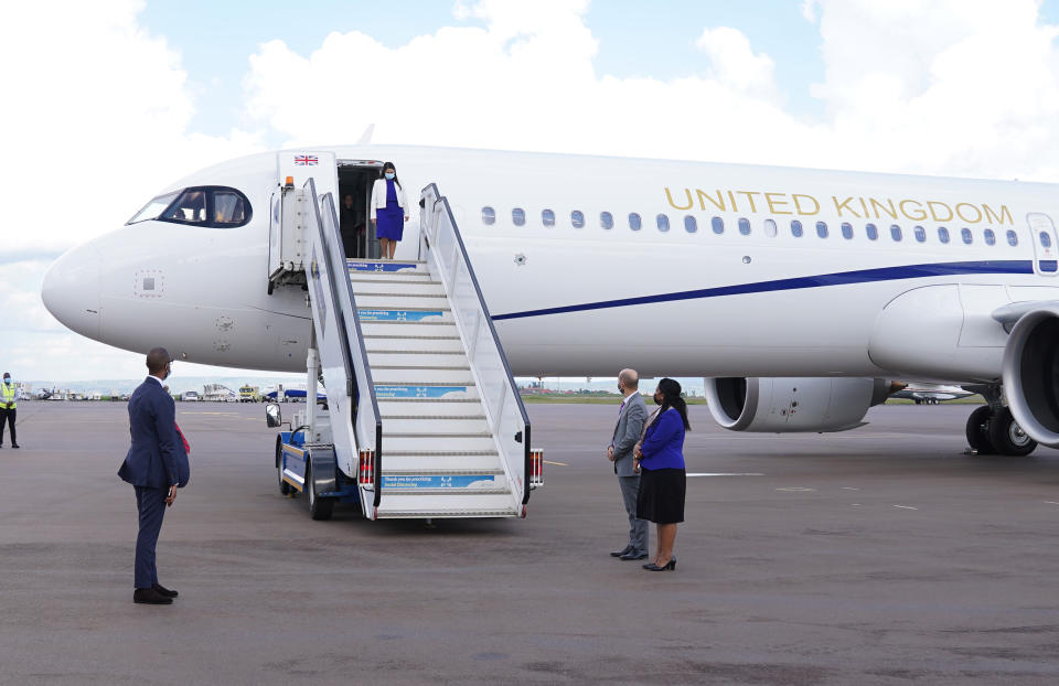 Embargoed to 2230 Wednesday April 13 Home Secretary Priti Patel is met by delegates as she arrives in Rwanda. Picture date: Wednesday April 13, 2022.