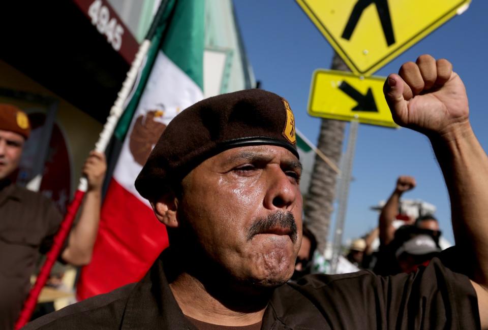 Brown Berets salute Mexican-American journalist Ruben Salazar during a gathering at the site of the old Silver Dollar Bar