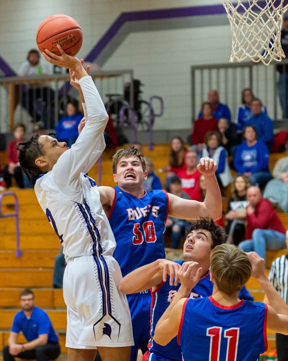 Nakari Morrical-Palmer (2) rises over three Republic County defenders in Southeast of Saline's 53-31 home victory Tuesday. 