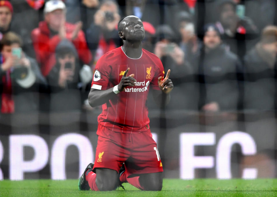 LIVERPOOL, ENGLAND - DECEMBER 04: Sadio Mane of Liverpool celebrates after scoring his team's fourth goal during the Premier League match between Liverpool FC and Everton FC at Anfield on December 04, 2019 in Liverpool, United Kingdom. (Photo by Laurence Griffiths/Getty Images)