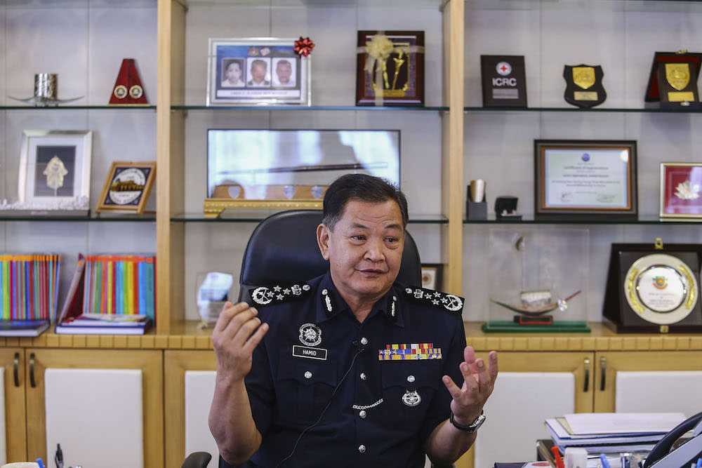 Inspector-General of Police Datuk Seri Abdul Hamid Bador answers questions during an interview with Malay Mail at his office in Bukit Aman Kuala Lumpur July 17, 2019. — Picture by Hari Anggara