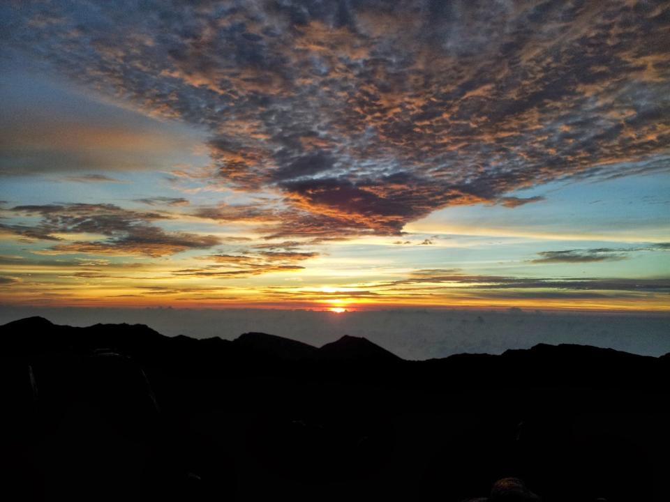Haleakalā National Park is known for its stunning sunrises. Visitors must make reservations to see it from the park's summit.