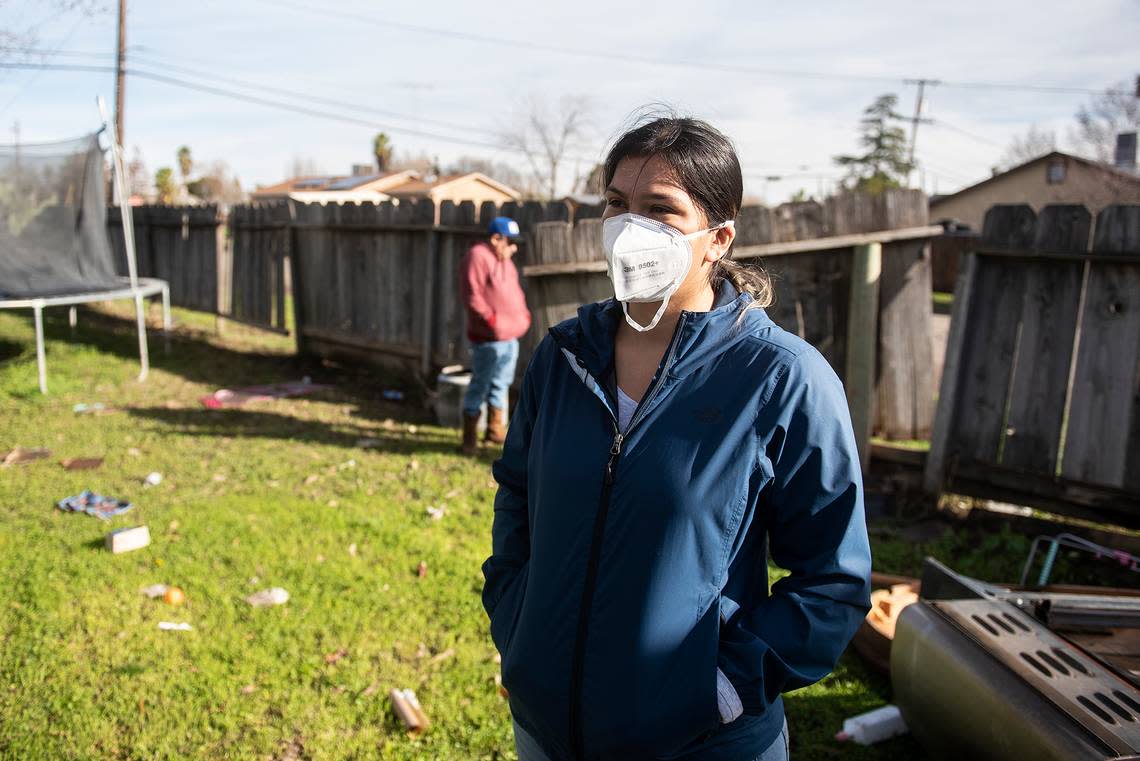 Isabel Ramirez, 24, speaks about having to evacuate from her home due to flooding in Planada, Calif., on Thursday, Jan. 12, 2023. Ramirez recently returned to her home after the Merced County Sheriff’s Office downgraded an evacuation order to a warning.