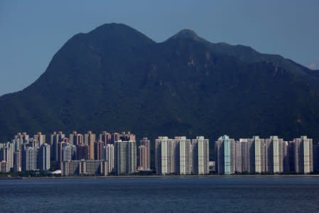 FILE PHOTO: Residential apartments are seen under Ma On Shan peak in Hong Kong, China August 29, 2017.   REUTERS/Bobby Yip/File Photo