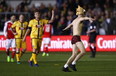 Britain Football Soccer - Sutton United v Arsenal - FA Cup Fifth Round - The Borough Sports Ground - 20/2/17 A streaker on the pitch Reuters / Eddie Keogh Livepic