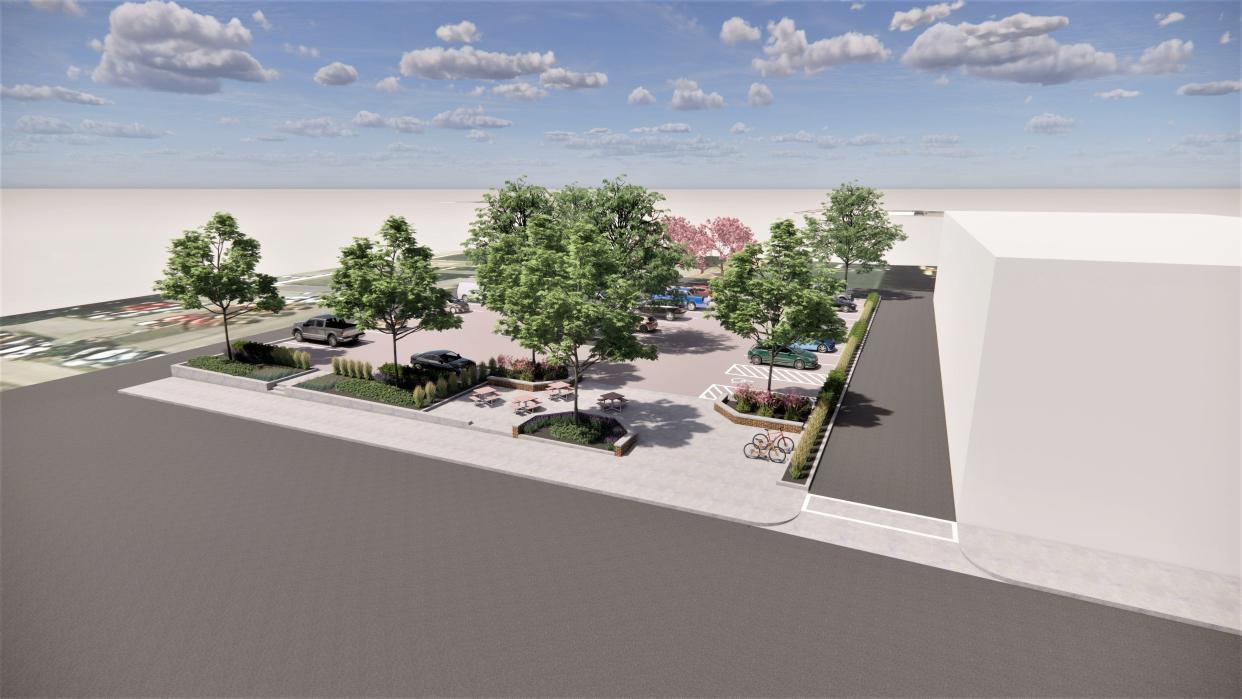 This is an architect's rendering of the proposed parking area and smart park that Marion Public Health wants to create after the building it owns at 197 S. Main St. in downtown Marion is demolished. Health Commissioner Traci Kinsler said the plan includes installing free Wi-Fi, charging stations, a water bottle filling station, and a meeting space with tables and benches in the space.