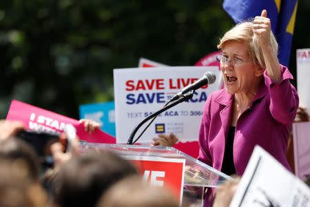 Sen. Elizabeth Warren (D-MA) speaks during a demonstration against the Republican repeal of the Affordable Care Act, outside the U.S. Capitol in Washington, U.S., June 21, 2017. REUTERS/Aaron P. Bernstein