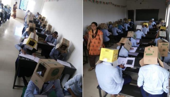 The boxes effectively acted as blinkers for the pupils and the school argues it was done with their permission. (BBC/Twitter)