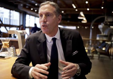 Starbucks President, Chairman and CEO Howard Schultz is interviewed during a preview of the company's new Reserve Roastery and Tasting Room in conjunction with its biennial investor meeting in Seattle, Washington December 4, 2014. REUTERS/Jason Redmond