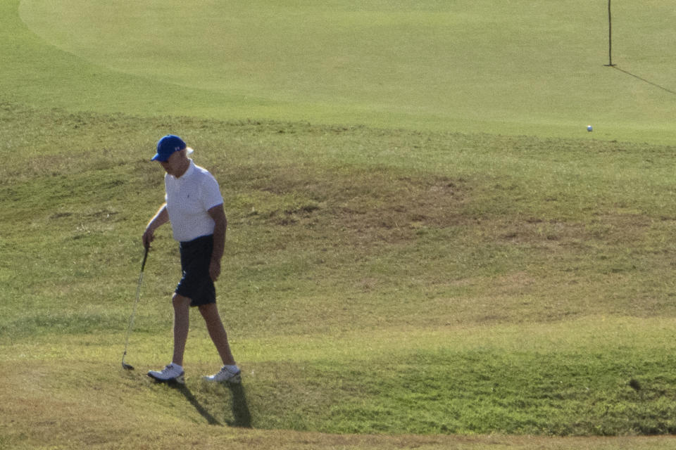 President Joe Biden plays golf at The Buccaneer in Christiansted, U.S. Virgin Islands, Friday, Dec. 30, 2022. (AP Photo/Manuel Balce Ceneta)