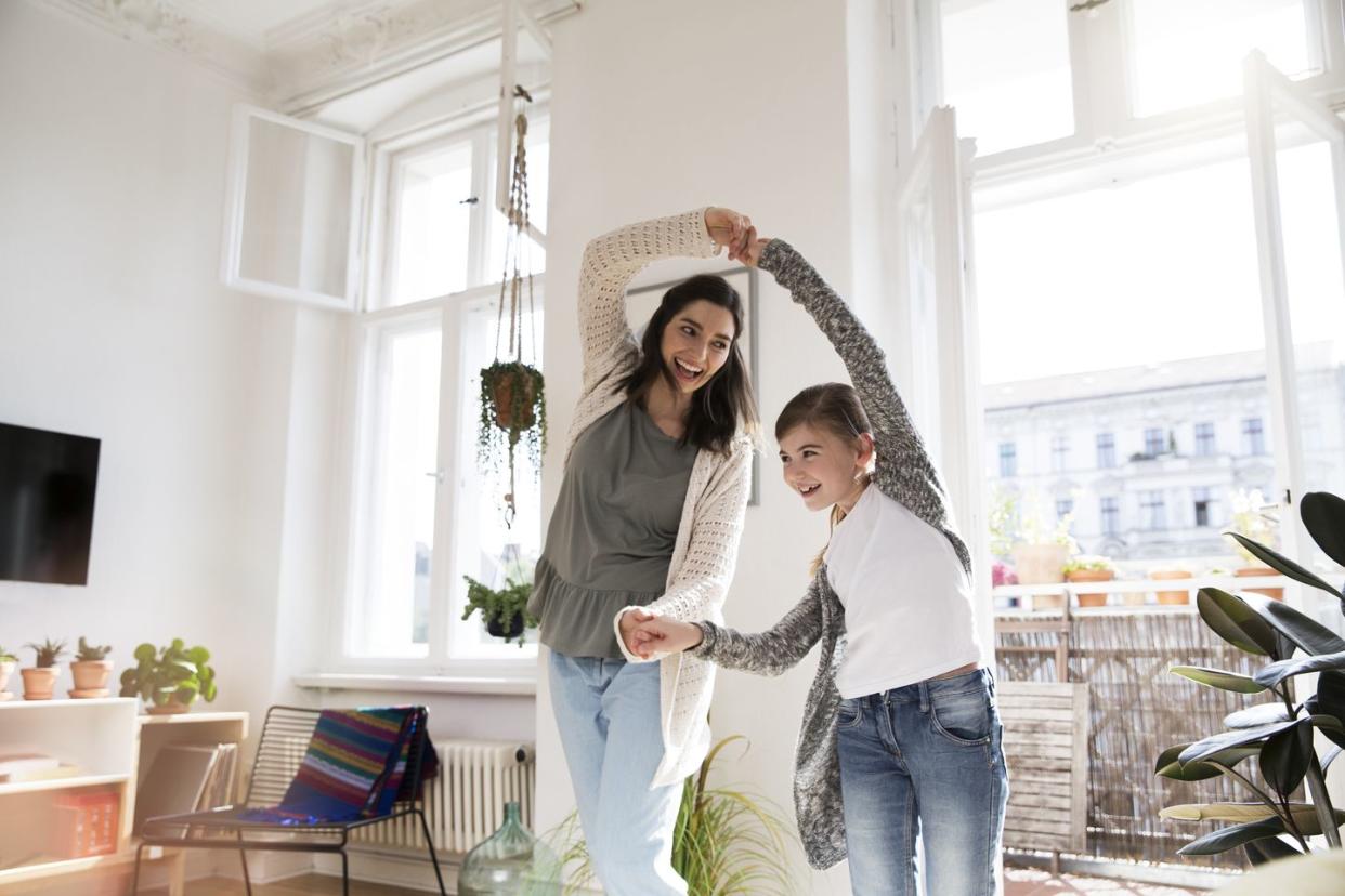 happy mother with daughter at home