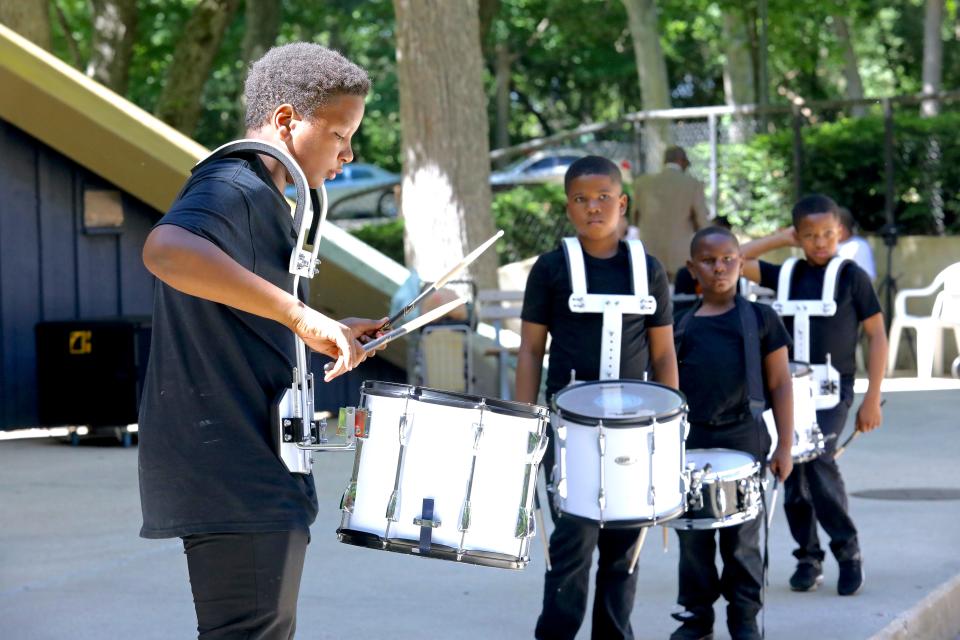 Members of the drum team from Christ The Carpenter Church perform during Rockford's Juneteenth celebration Sunday, June 19, 2022, at Sinnissippi Park.