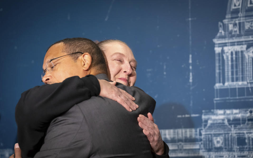 Minnesota Attorney General Keith Ellison is hugged by Nicole Smith-Holt during a press conference, Wednesday, Feb. 7, 2024, in St. Paul, Minn. Her son Alec passed away due to diabetic ketoacidosis after he was forced to ration his insulin due to its high cost. Ellison announced Wednesday a settlement with Eli Lilly in his litigation against the 3 largest insulin manufacturers. (Glen Stubbe/Star Tribune via AP)