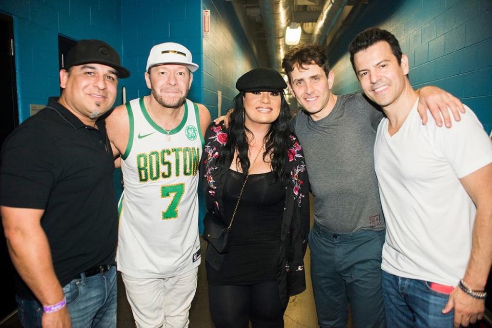 Members of New Kids on the Block pose with Suzette Quintanilla in Corpus Christi, Texas.