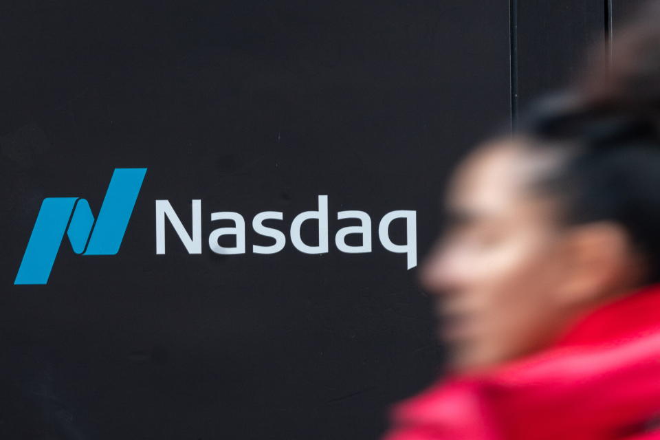 FTSE  The Nasdaq logo is displayed at the Nasdaq Market site in Times Square in New York City, U.S., December 3, 2021. REUTERS/Jeenah Moon