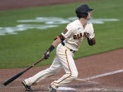 San Francisco Giants' Mike Yastrzemski hits a single to drive in a run against the Arizona Diamondbacks during the sixth inning of a baseball game on Monday, Sept. 7, 2020, in San Francisco. (AP Photo/Tony Avelar)