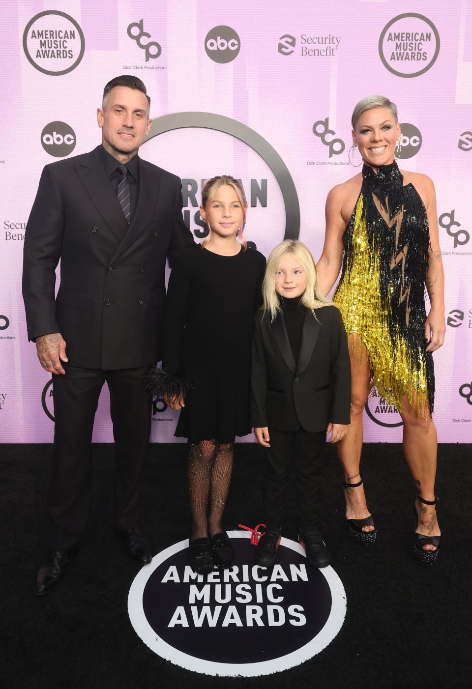 LOS ANGELES, CALIFORNIA - NOVEMBER 20: (L-R) Carey Hart, Willow Sage Hart, Jameson Moon Hart, and P!nk attend the 2022 American Music Awards at Microsoft Theater on November 20, 2022 in Los Angeles, California. (Photo by Emma McIntyre/Getty Images for dcp)