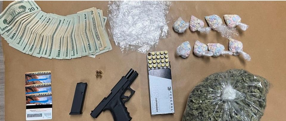 A traffic stop in Adelanto led to the arrest of a wanted fugitive, as well as the recovery of a handgun and an "extensive amount" of fentanyl-laced ecstasy pills, sheriff's officials said.